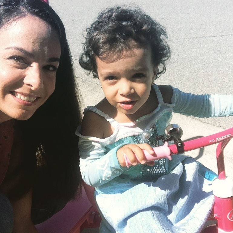 My little princess going out for a ride on her tricycle!